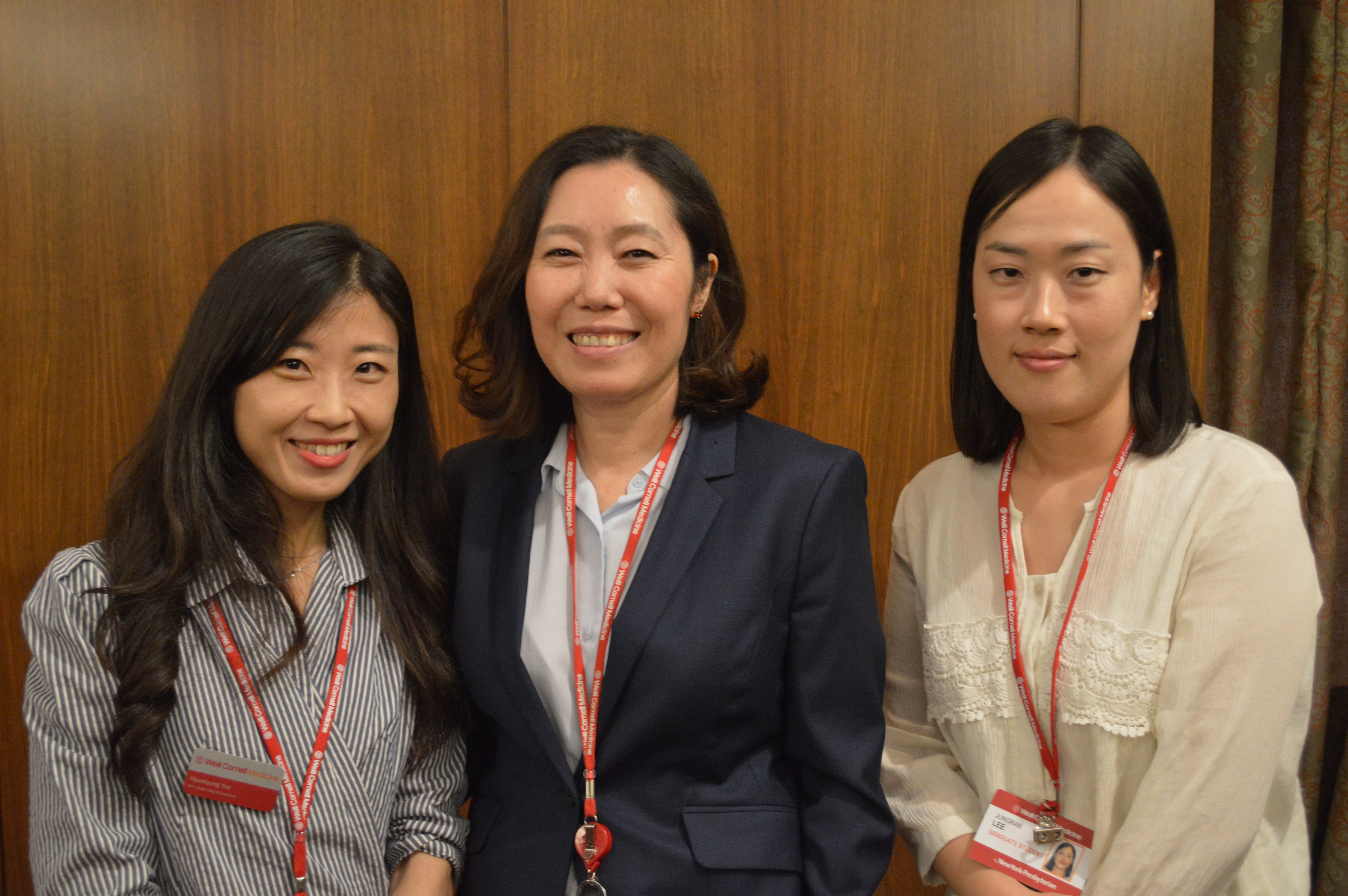 First-year students Hyunkyung Yun (left) and Jungran Lee (right) with Dr. Arian Jung, Director of the M.S. in Health Policy and Economics Photo of students with Dr. Jung