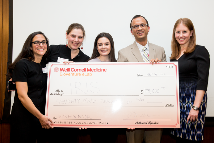First place winner Iris team members from left: Drs. Rochelle Joly, Alison Hermann, Meghan Reading Turchioe, Jyotishman Pathak, and graduate student Andrea Cohen. (Not pictured: Dr. Yiye Zhang). All photo: Ashley Jones. Photo of Iris team